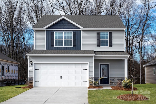 3323 Burberry Dr, Gastonia, NC 28052 - view of front of property with an attached garage, driveway, stone siding, and a front yard