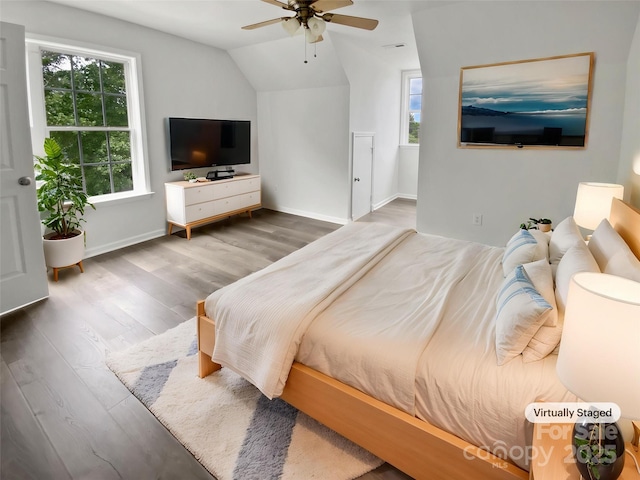 204 W Boyd St, Maiden, NC 28650 - bedroom featuring wood finished floors, lofted ceiling, multiple windows, baseboards, and ceiling fan