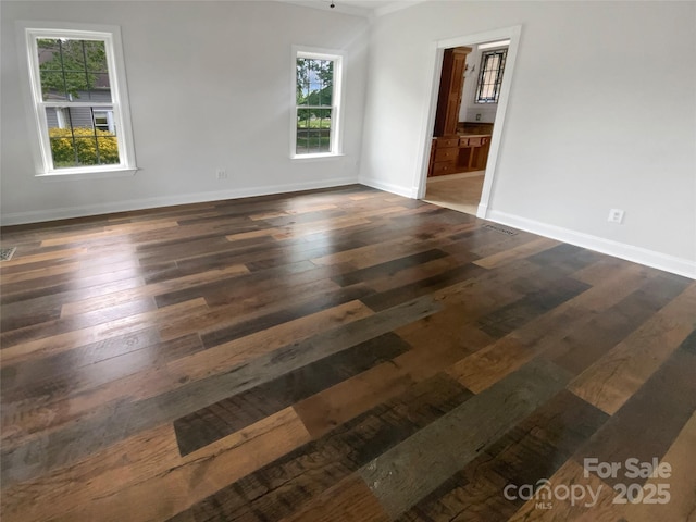 204 W Boyd St, Maiden, NC 28650 - spare room with plenty of natural light, hardwood / wood-style floors, and baseboards