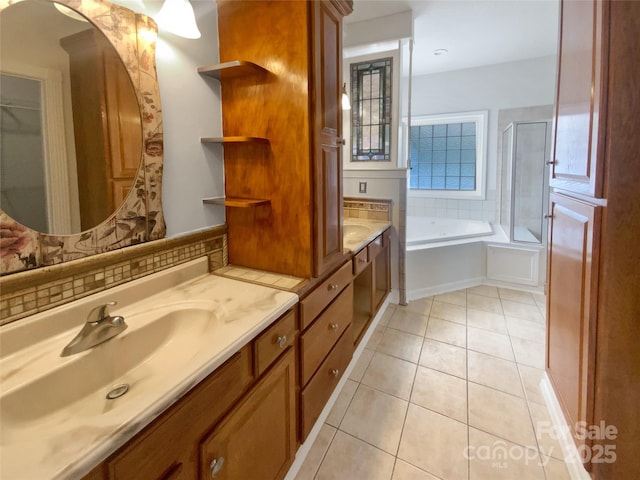 204 W Boyd St, Maiden, NC 28650 - full bath featuring double vanity, a bath, tile patterned flooring, and a shower
