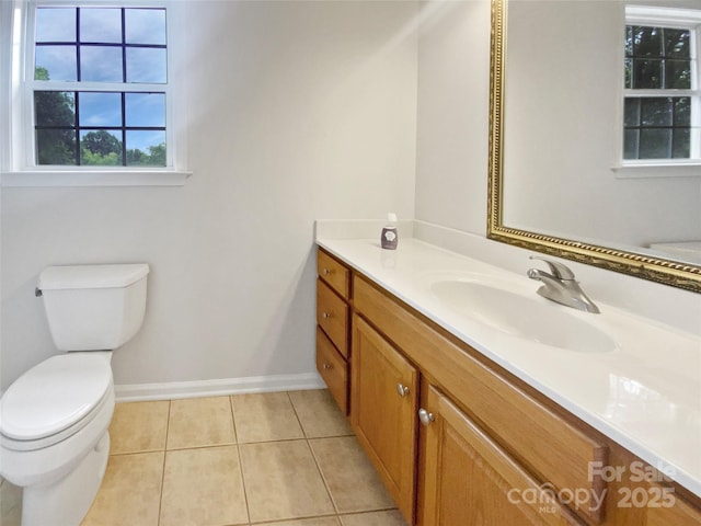 204 W Boyd St, Maiden, NC 28650 - bathroom featuring toilet, vanity, tile patterned flooring, and baseboards