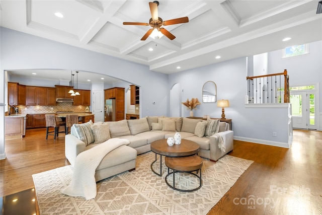 2289 Pine Valley Dr, Denver, NC 28037 - living area featuring arched walkways, a ceiling fan, coffered ceiling, beamed ceiling, and recessed lighting