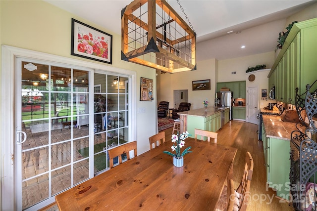 2310 Gill Jordan Rd, Chester, SC 29706 - dining room featuring wood finished floors and a towering ceiling