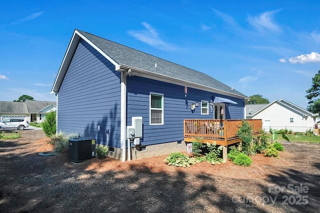 5016 Old Pine Ln, Cherryville, NC 28021 - back of property with a wooden deck, central AC unit, crawl space, and a shingled roof