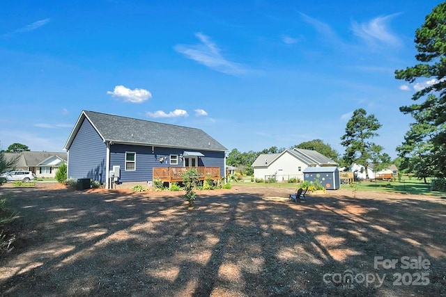 5016 Old Pine Ln, Cherryville, NC 28021 - rear view of property featuring a wooden deck, cooling unit, and a shingled roof