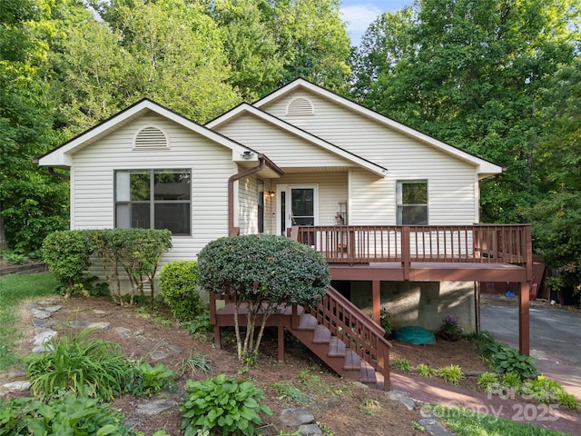 100 Tarragon Pl, Flat Rock, NC 28731 - view of front of home featuring a wooden deck and stairs