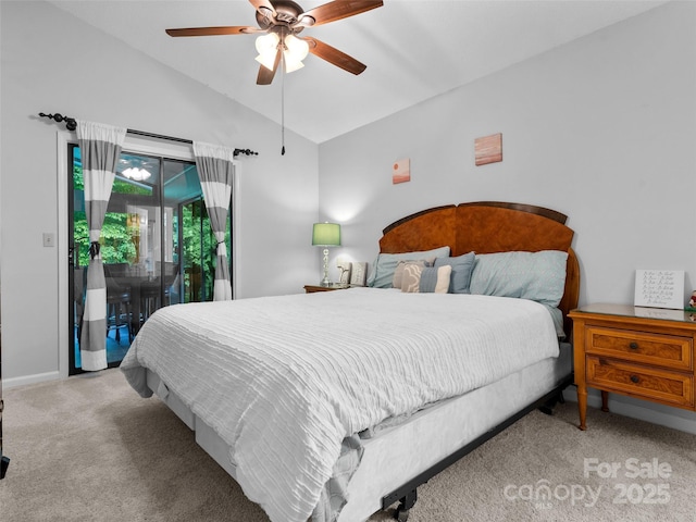 100 Tarragon Pl, Flat Rock, NC 28731 - carpeted bedroom with vaulted ceiling, access to exterior, baseboards, and a ceiling fan
