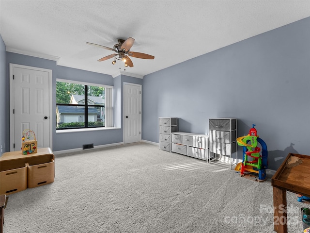 100 Tarragon Pl, Flat Rock, NC 28731 - recreation room featuring ceiling fan, carpet, baseboards, and a textured ceiling