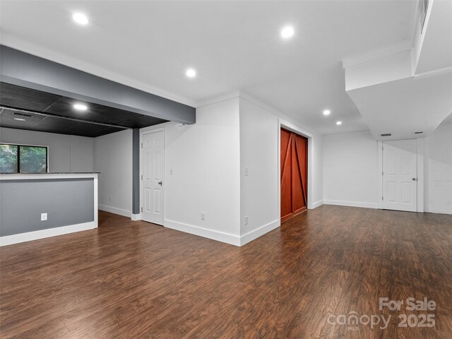 100 Tarragon Pl, Flat Rock, NC 28731 - below grade area featuring recessed lighting, wood finished floors, and baseboards