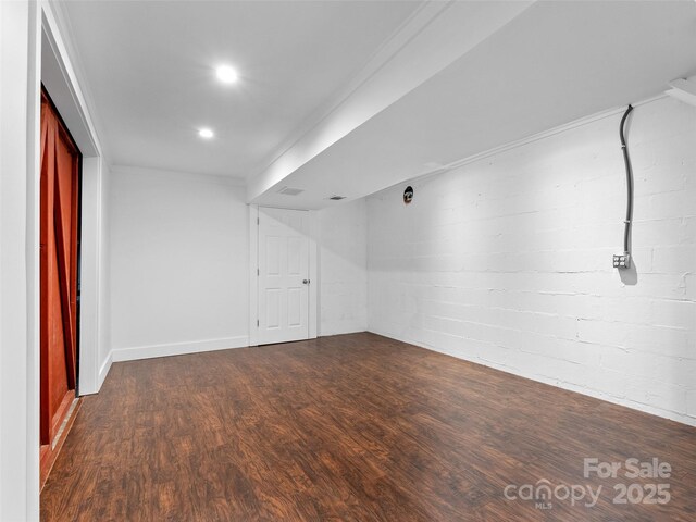 100 Tarragon Pl, Flat Rock, NC 28731 - finished below grade area featuring dark wood-type flooring and recessed lighting