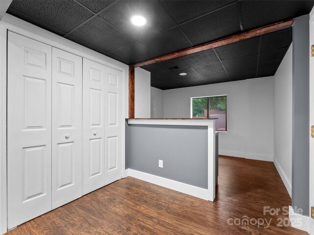 100 Tarragon Pl, Flat Rock, NC 28731 - basement featuring dark wood-style floors, baseboards, a drop ceiling, and recessed lighting