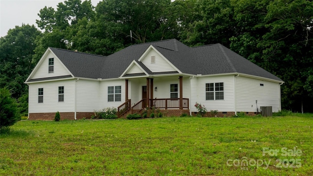 4710 Old Pageland Marshville Rd, Monroe, NC 28112 - view of front of house with a porch, crawl space, a shingled roof, a front lawn, and central air condition unit