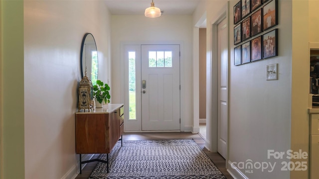 4710 Old Pageland Marshville Rd, Monroe, NC 28112 - foyer entrance featuring wood finished floors and baseboards