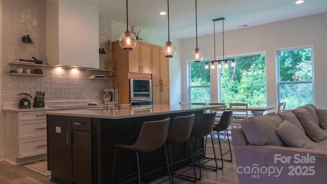 4710 Old Pageland Marshville Rd, Monroe, NC 28112 - kitchen with light countertops, tasteful backsplash, dark wood finished floors, a kitchen breakfast bar, and recessed lighting