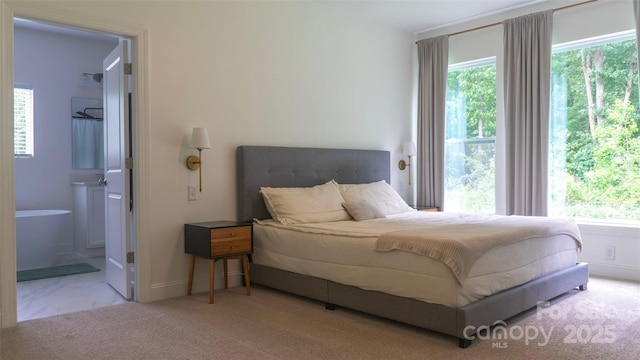 4710 Old Pageland Marshville Rd, Monroe, NC 28112 - carpeted bedroom with baseboards and ensuite bath