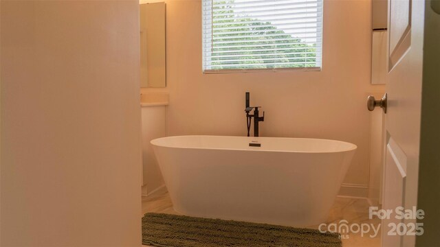 4710 Old Pageland Marshville Rd, Monroe, NC 28112 - full bathroom with a soaking tub and marble finish flooring