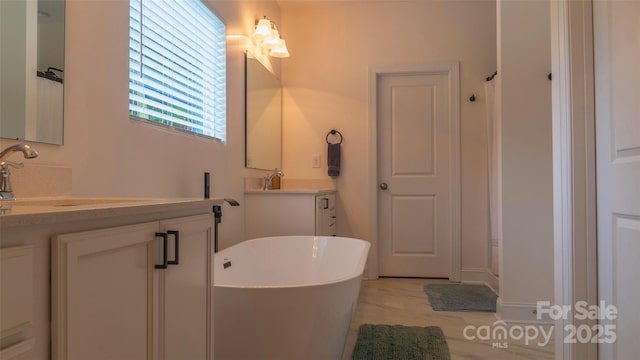 4710 Old Pageland Marshville Rd, Monroe, NC 28112 - full bathroom featuring a freestanding tub and vanity