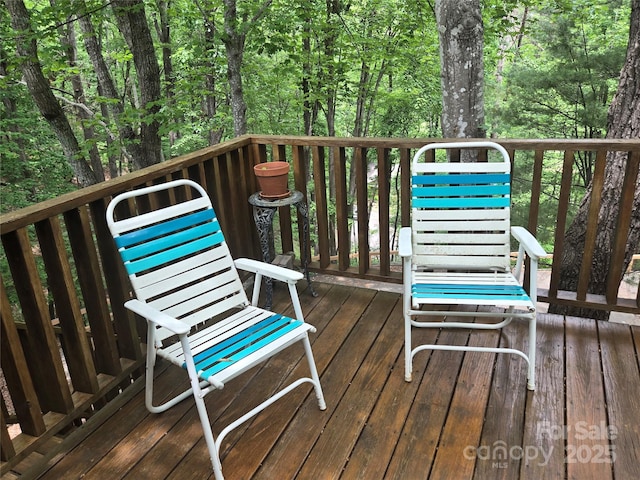 105 Bent Creek Blvd Unit 16, Lake Lure, NC 28746 - wooden deck with a forest view