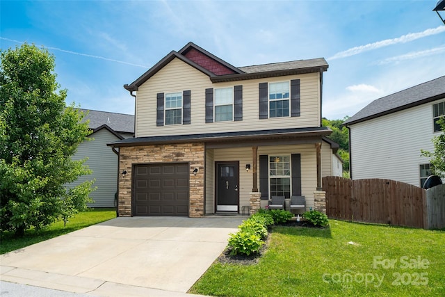 624 Cardwell Ln, Fletcher, NC 28732 - craftsman house featuring stone siding, covered porch, concrete driveway, and a garage