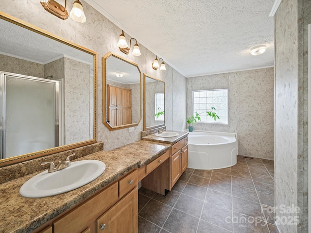 714 Helms Efird Rd, Marshville, NC 28103 - full bathroom featuring a textured ceiling, crown molding, wallpapered walls, double vanity, and a stall shower