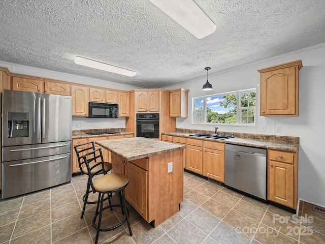 714 Helms Efird Rd, Marshville, NC 28103 - kitchen featuring black appliances, a center island, light tile patterned flooring, pendant lighting, and a kitchen breakfast bar