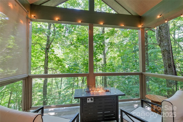 145 Inn At Crestwood Dr, Boone, NC 28607 - sunroom with lofted ceiling and an outdoor fire pit