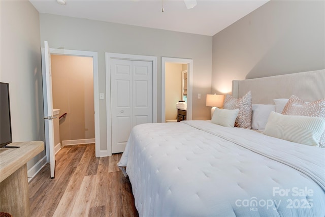 145 Inn At Crestwood Dr, Boone, NC 28607 - bedroom with light wood-type flooring, a closet, baseboards, and ceiling fan