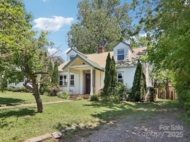 27 Alabama Ave, Weaverville, NC 28787 - new england style home with stucco siding, a front lawn, and a chimney