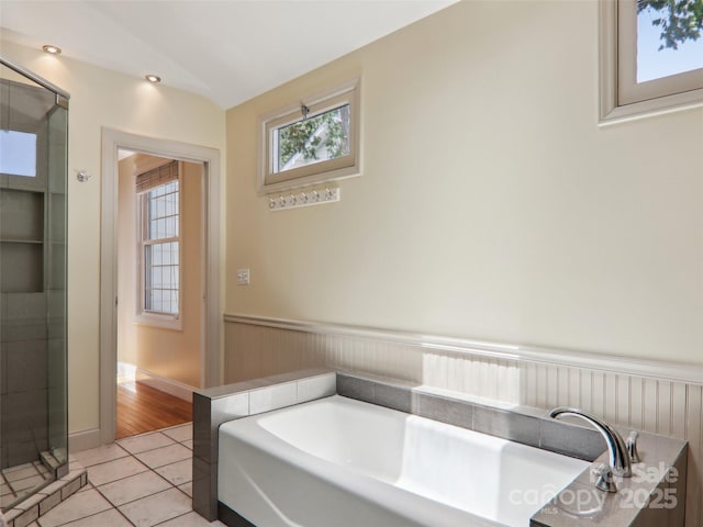 27 Alabama Ave, Weaverville, NC 28787 - full bathroom with tile patterned flooring, a wainscoted wall, and a garden tub