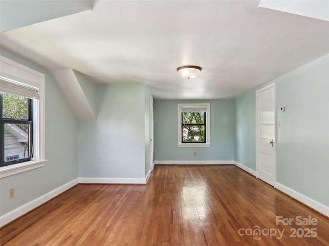 27 Alabama Ave, Weaverville, NC 28787 - bonus room with baseboards and wood-type flooring