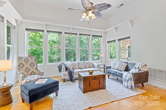 190 Jonathan Creek Dr, Etowah, NC 28729 - living room with a ceiling fan, light wood finished floors, and baseboards