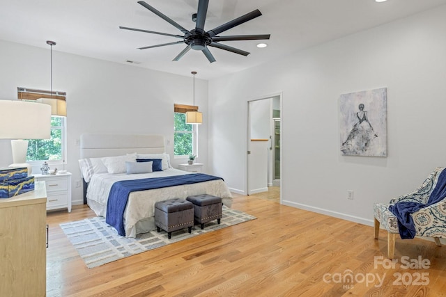 190 Jonathan Creek Dr, Etowah, NC 28729 - bedroom featuring multiple windows, light wood-style flooring, recessed lighting, baseboards, and ceiling fan