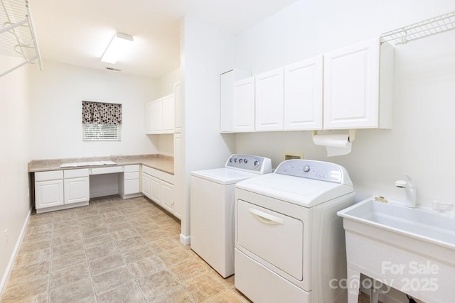 190 Jonathan Creek Dr, Etowah, NC 28729 - washroom featuring cabinet space, washing machine and dryer, an office area, and baseboards