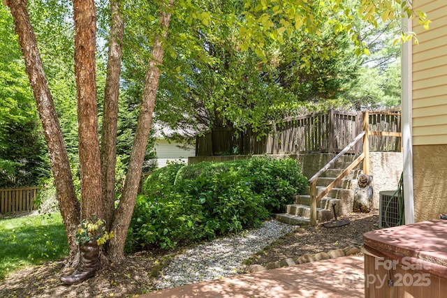 190 Jonathan Creek Dr, Etowah, NC 28729 - view of yard featuring central AC unit and stairway