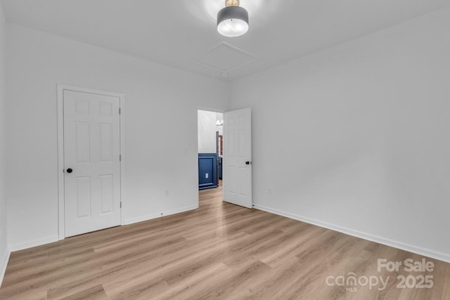 1246 Bob Falls Rd, Shelby, NC 28150 - unfurnished bedroom with light wood-style flooring and attic access