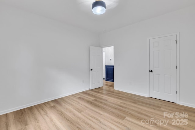 1246 Bob Falls Rd, Shelby, NC 28150 - empty room with light wood finished floors and baseboards