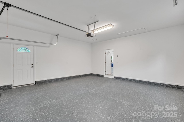 1246 Bob Falls Rd, Shelby, NC 28150 - garage featuring a garage door opener and baseboards