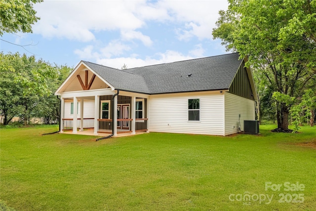 1246 Bob Falls Rd, Shelby, NC 28150 - rear view of house featuring a patio, a lawn, roof with shingles, and board and batten siding