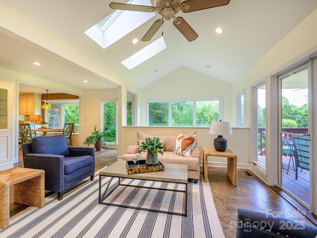 7356 Terrace Dr, Charlotte, NC 28211 - living area with recessed lighting, a skylight, ceiling fan, baseboards, and high vaulted ceiling