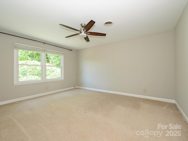 7356 Terrace Dr, Charlotte, NC 28211 - empty room with ceiling fan, light carpet, and baseboards