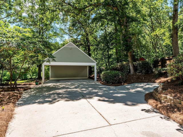 7356 Terrace Dr, Charlotte, NC 28211 - garage featuring driveway and a carport