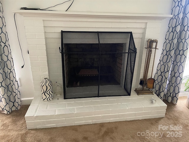 114 Aqua Dr, Forest City, NC 28043 - detailed view of a brick fireplace and carpet floors
