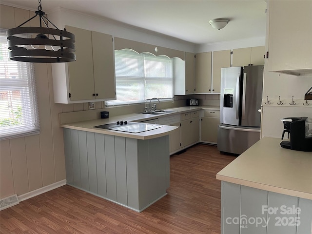114 Aqua Dr, Forest City, NC 28043 - kitchen featuring stainless steel fridge, a sink, wood finished floors, and black electric cooktop