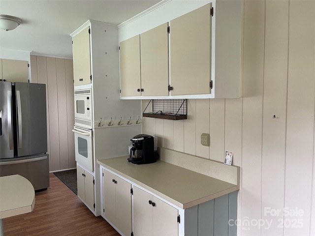 114 Aqua Dr, Forest City, NC 28043 - kitchen featuring freestanding refrigerator, oven, dark wood-style floors, light countertops, and white microwave