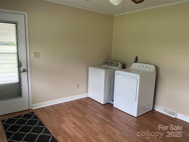114 Aqua Dr, Forest City, NC 28043 - laundry area featuring independent washer and dryer, wood finished floors, baseboards, crown molding, and a ceiling fan