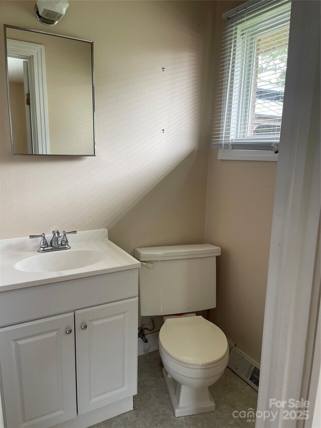 114 Aqua Dr, Forest City, NC 28043 - bathroom featuring toilet, vanity, and tile patterned floors