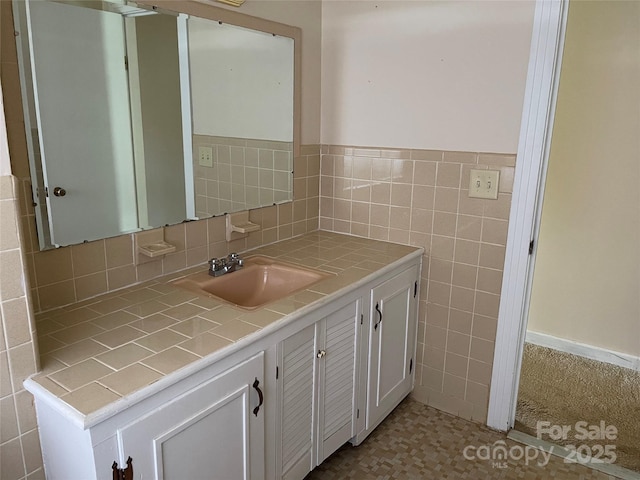 114 Aqua Dr, Forest City, NC 28043 - bathroom featuring tile walls and vanity