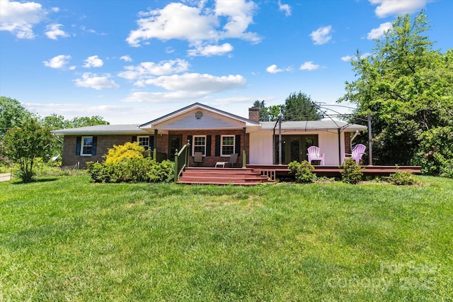 103 Hampshire Ln, Canton, NC 28716 - ranch-style house with a chimney, a front lawn, brick siding, and a deck