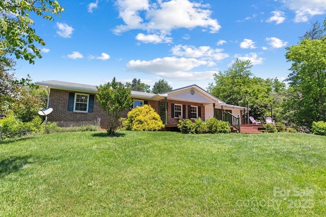 103 Hampshire Ln, Canton, NC 28716 - view of front of property featuring brick siding and a front lawn