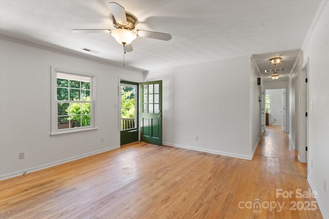 103 Hampshire Ln, Canton, NC 28716 - unfurnished room with ceiling fan, light wood-style flooring, crown molding, and baseboards